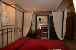 Tolentino Suites
